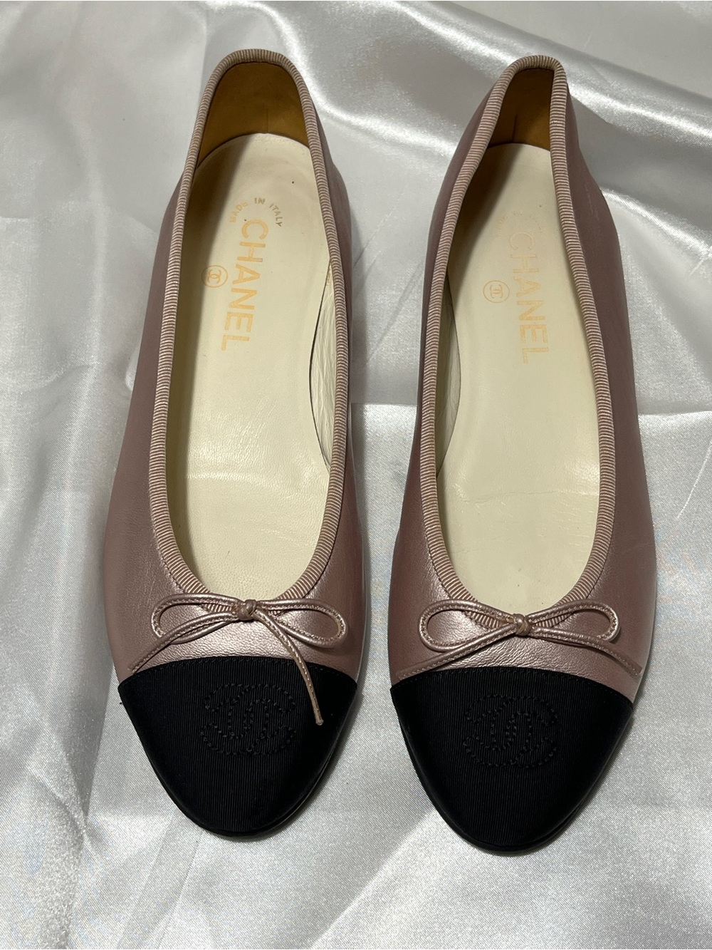 CHANEL Pink and Black Leather Cap-Toe Ballet Flats